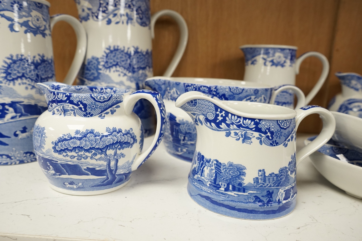 A collection of Spode Italian, comprising graduated jugs, dishes, pickle dishes, pots etc.(23). Largest 20.5cm